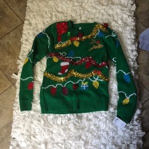 Never worn before Christmas sweater